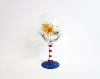 Hand painted wine glass fourth of July labor day memorial day fireworks flag patriotic glass red white and blue custom glass