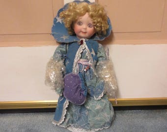Gloria Vanderbilt's "Sorcerer" Witch Porcelain Doll with a children's music CD, Excellent for Halloween decorating, COA number 10 of 750 pcs