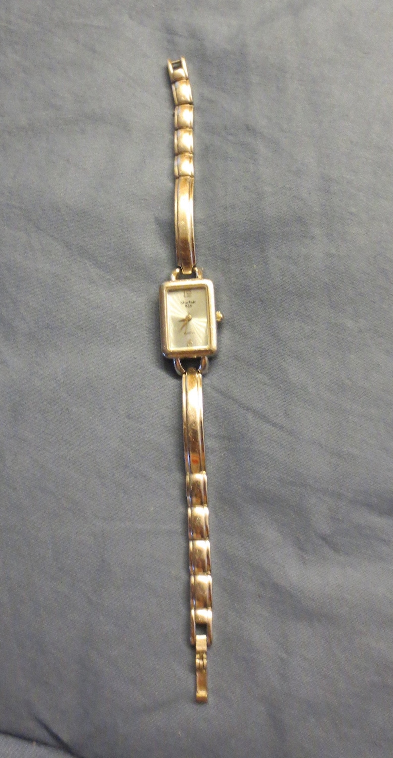 Vintage Ladies Silver Fashion Watch Light blue Face Watch image 0