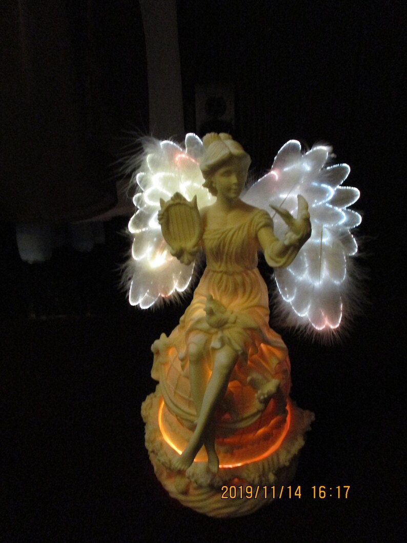 Revolving Cold Cast Porcelain Angel with Fiber Optic Wings  image 0