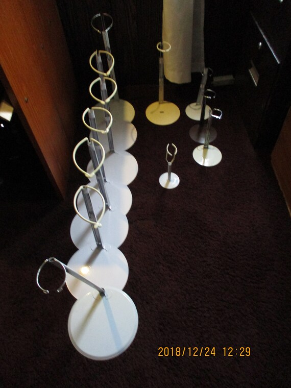 porcelain doll stands