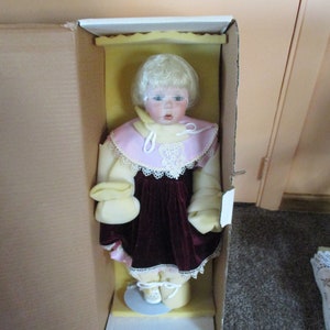 24 Inch Toddler, Caley, in Burgundy Velvet and Pink Porcelain Doll COA, Original Box, White Metal Stand, Blanket, Bonnet, Pristine Condition image 2