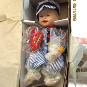 The Little Conductor 1996 McDonald&#39;s Commissioned Porcelain Certificate Boy doll by Yolanda Bello in Orig Box Excellent for Doll Collector