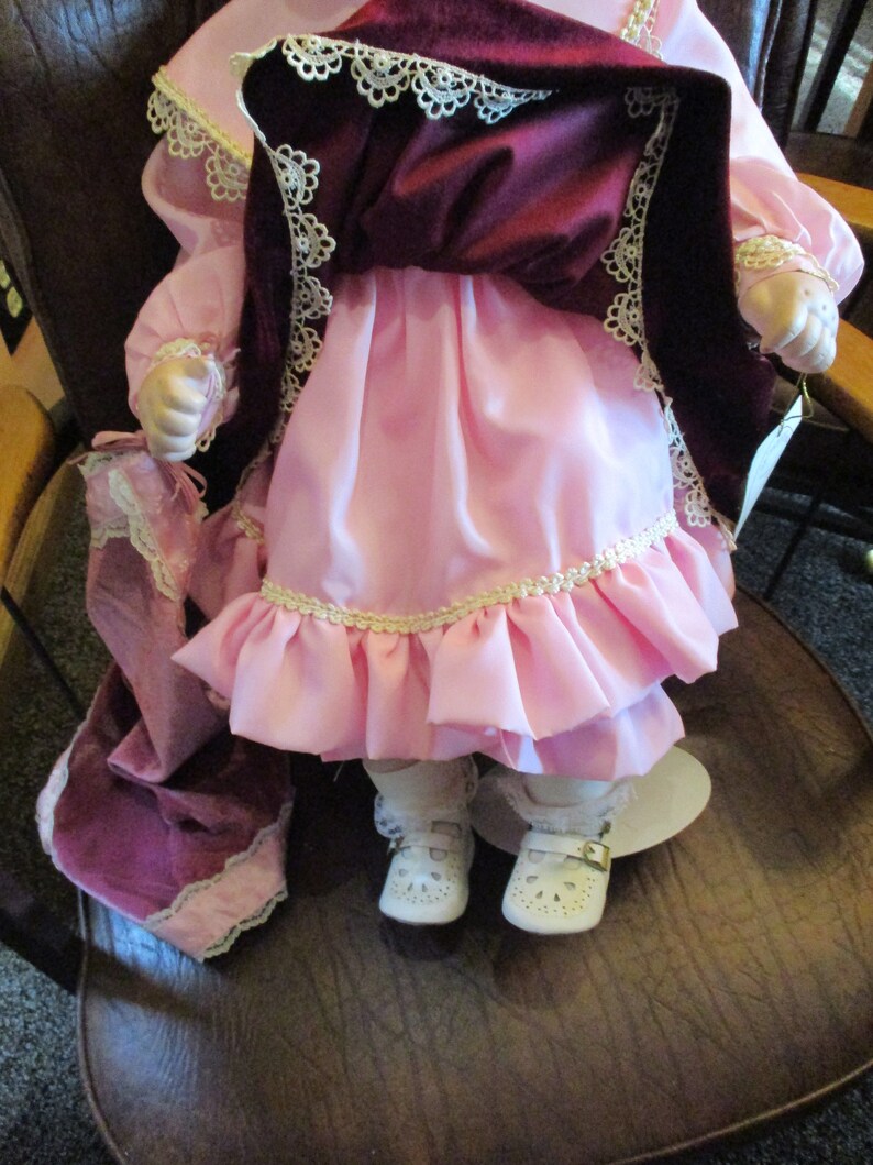 24 Inch Toddler, Caley, in Burgundy Velvet and Pink Porcelain Doll COA, Original Box, White Metal Stand, Blanket, Bonnet, Pristine Condition image 8