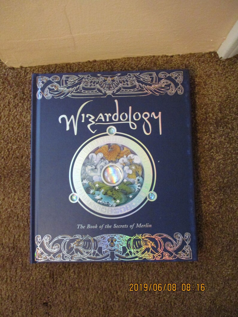 Children's/Adult Wizardology Hard Cover Book with loads of image 0