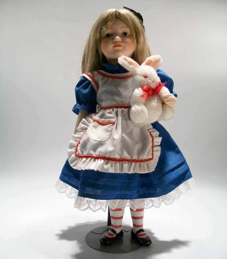 Vintage 88 Alice in Wonderland-porcelain doll with flocked image 0