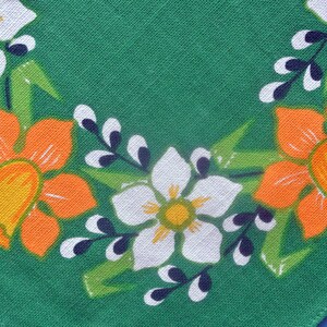Swedish vintage 1960s printed cotton design tablet tablecloth with Easter duffodil motive on darkgreen bottomcolor