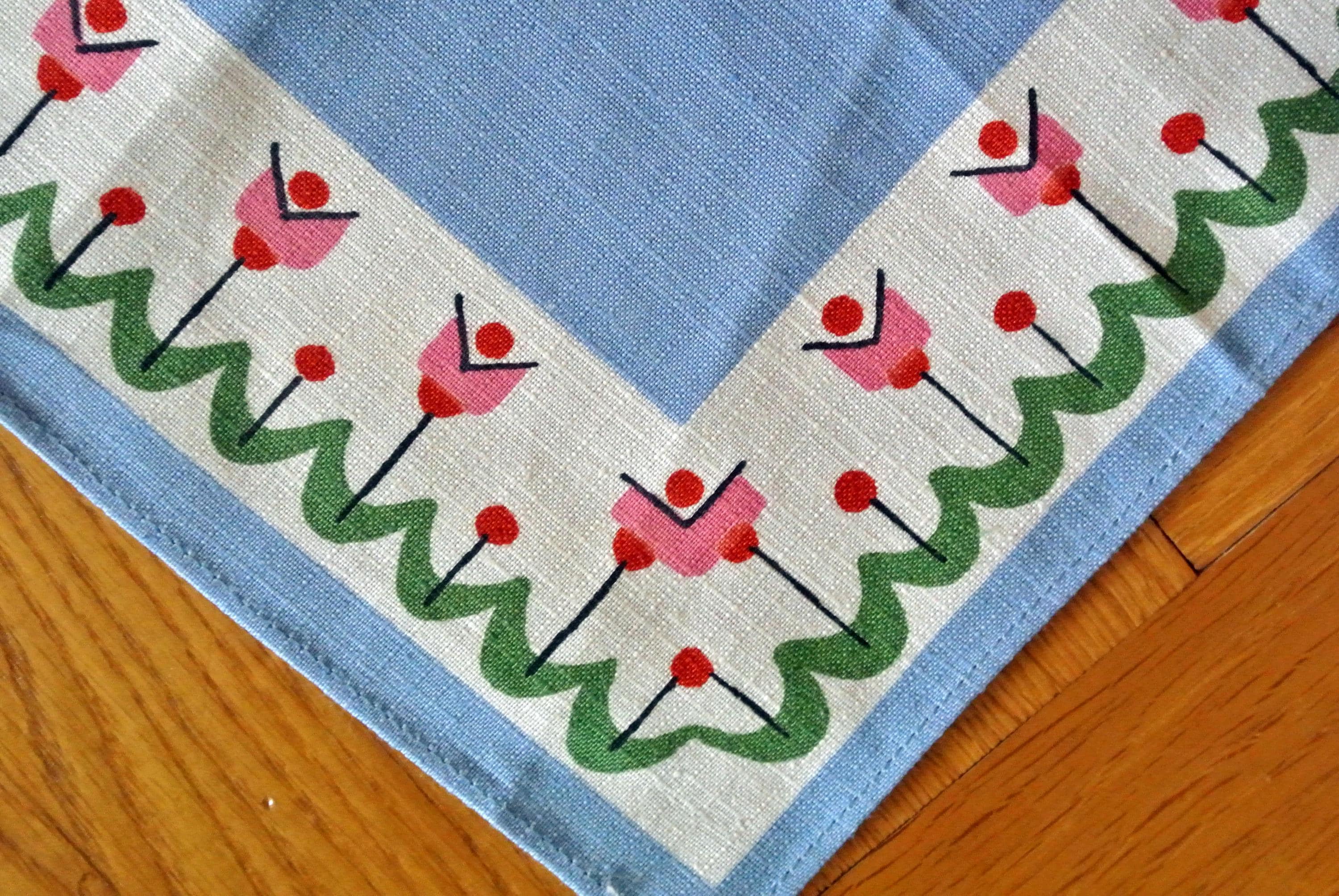 Swedish retro vintage 1970s small printed cotton design tablet tablecloth with pink/ red tulip flower frame motive on white/ blue bottom