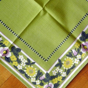 Swedish vintage 1960s unused larger printed cotton Hill design tablet table-cloth with multicolor flower motive frame on greenyellow bottom