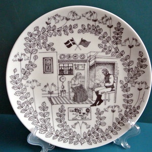 RARE assiette ronde en porcelaine blanche Gustavsberg, suédoise des années 1970, avec des motifs d&#39;immigrants noirs design Sven Jonson, édition limitée