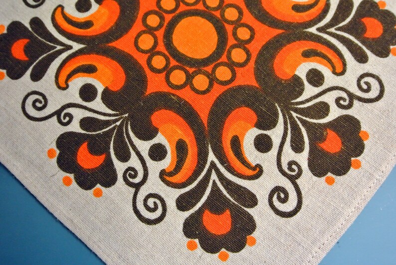 Swedish vintage 1960s printed linen BoWa design tablet tablecloth with orange red brown Kurbits motive on light beige bottomcolor