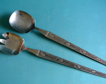 Swedish Pair of vintage 1960s silvercolor rustfrei steel salad cutlery set with tulip flower decor