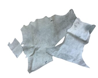 Off White Hair On Cow Hide Scraps