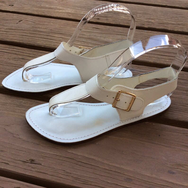 white flat thong sandals