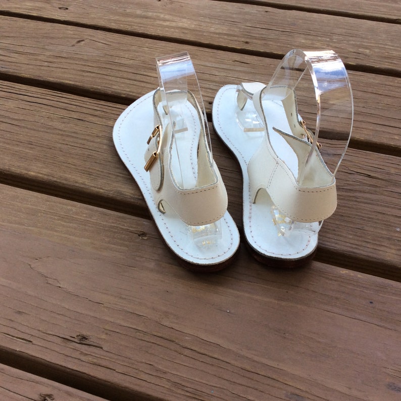 white flat thong sandals
