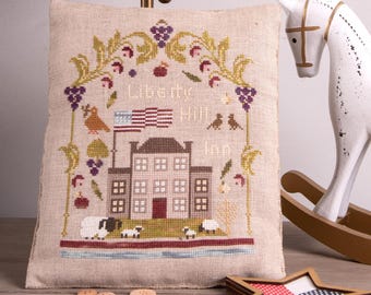 Schema per punto croce Liberty Hill Inn, sampler in stile americano primitivo - Decorazione patriottica per puntaspilli e ciotola per il 4 luglio (download PDF)