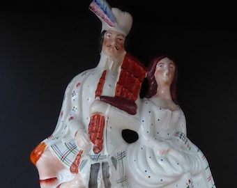 ANTIQUE Victorian Staffordshire Flatback Figurine. A Highlander and his Sweetheart Sitting on a Clock Face. Poor Man's Clock