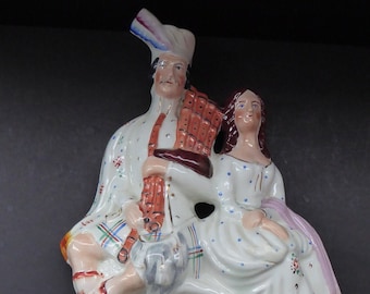 ANTIQUE Victorian Staffordshire Flatback Figurine. A Highlander and his Sweetheart Sitting on a Clock Face. Poor Man's Clock