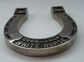 Image of 1930S Whisky Advertsing Collectable in The Form Of A Horseshoe. Vintage White Horse Whisky Souvenir