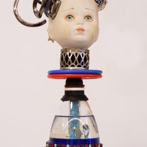 totem testa ,pezzi assemblage