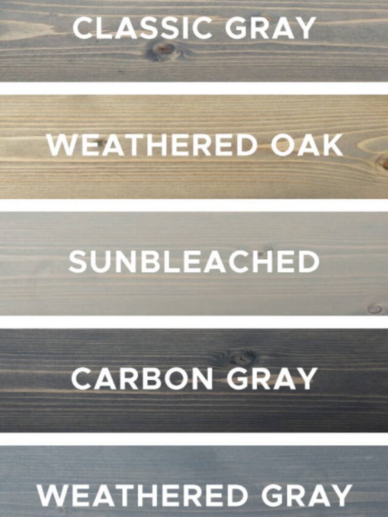 May include: Five wood samples stained in different shades of gray. The stains are labeled "Classic Gray", "Weathered Oak", "Sunbleached", "Carbon Gray", and "Weathered Gray".