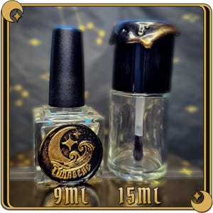 May include: Two glass bottles with black caps and gold accents. The smaller bottle is 9 ml and the larger bottle is 15 ml. Both bottles have a crescent moon and wave design on the label.