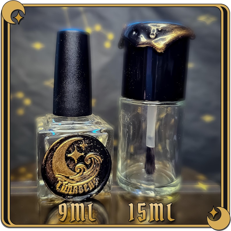 May include: Two glass bottles with black caps and gold accents. The smaller bottle is 9 ml and the larger bottle is 15 ml. Both bottles have a crescent moon and wave design on the label.