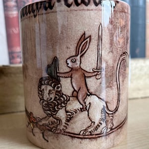 Medieval Duelling Rabbit on Lion and Snail/man Mug