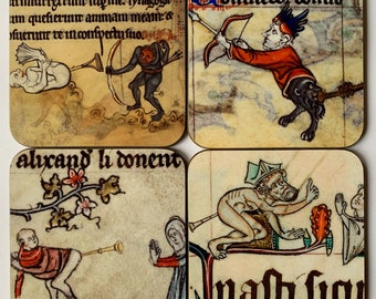 May include: Set of four square coasters featuring medieval-style illustrations. Each coaster depicts a different scene with a creature, including a man with a bow and arrow, a man with a horn, a man with a tail, and a man with a horn. The coasters are made of a light brown material with a slightly textured surface.
