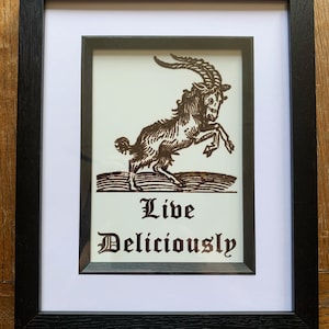 Black Phillip Framed Print