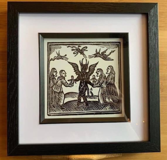 Framed print of Woodcut Witches Making Offerings to the Devil