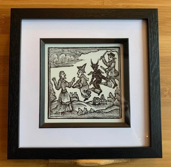Framed print of Woodcut Witches and Devil on Broomstick