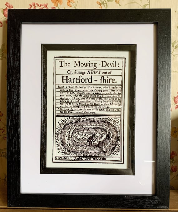 The Mowing Devil Framed Print