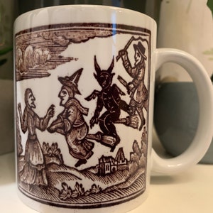 Witches and Devil on Broomstick mug