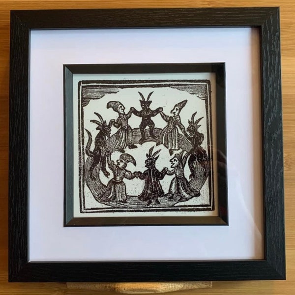 Framed print of Woodcut Witches dancing with Devils