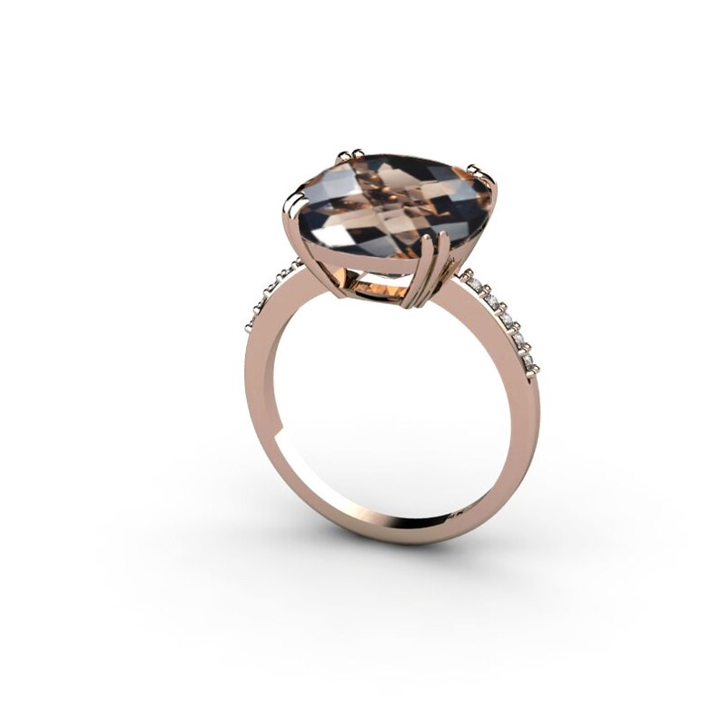 May include: A rose gold ring with a large, faceted, smoky quartz gemstone and a band of smaller diamonds.