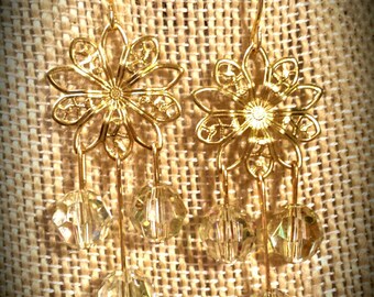 Pale Yellow Swarovski Crystal Rondelles Dangling From Stamped Brass Flower Links on Gold Finished Steel Earrings
