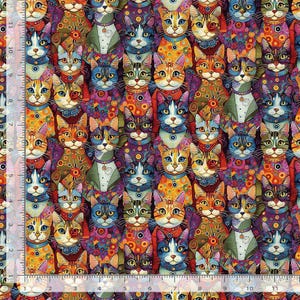May include: A fabric pattern featuring a repeating grid of stylized cats in vibrant, multicolored designs. A clear ruler is visible along the left and bottom edges, showing measurements in inches up to 11 inches on both sides of the textile.