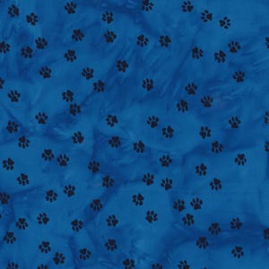May include: A blue fabric with a pattern of black paw prints. The paw prints are scattered across the fabric, creating a playful and whimsical design. The fabric has a mottled appearance, adding depth and texture to the overall look.