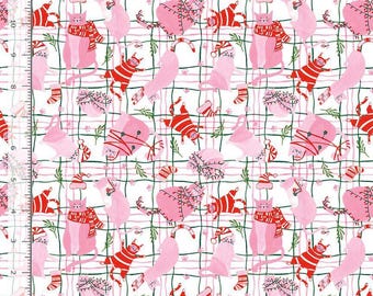 May include: A white fabric featuring a repeating pattern of pink cats, some wearing red and white striped scarves or hats, and others tangled in red string lights. A ruler along the left and bottom edges shows a scale of 11 inches.
