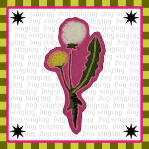 May include: A pink embroidered patch depicting a dandelion with a fluffy white seed head and a yellow flower. The patch has green leaves and stems, with a black and green border. The background has the text "singing dog" repeated.