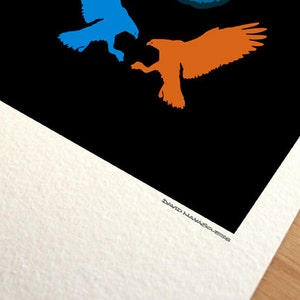 May include: A black and white print of two birds in flight. The bird on the left is blue and the bird on the right is orange. The print is signed "David Navasques".