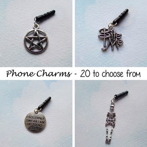 May include: A selection of silver phone charms with black plugs. Designs include a pentagram, the words "Bite Me", a circular charm with text, and a skeleton. The text "Phone Charms - 20 to choose from" is also visible.