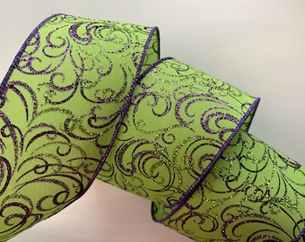 May include: Lime green ribbon with a glittery purple and black swirl pattern. The ribbon has a purple stitched edge. This decorative ribbon is ideal for crafts, gift wrapping, and holiday decorations.
