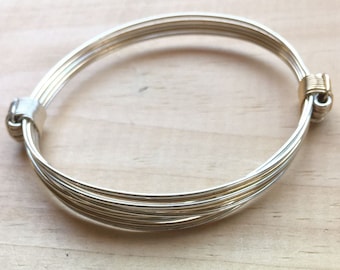 SimbaCub zierliches leichtes Kombi Silber und Gold Elefant Haarstil Knoten Armband