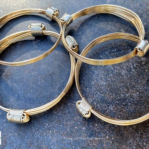 Gold with silver knots elephant hair bracelets and bangles