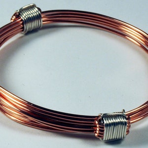 African Love Knots bracelet in copper with silver knots
