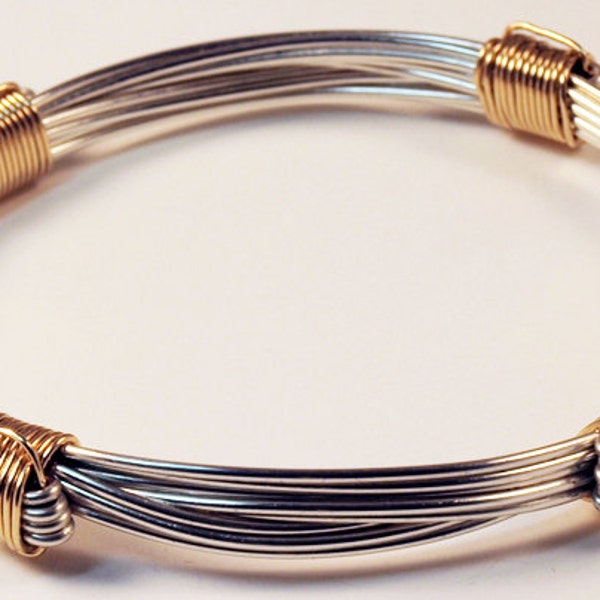 Elephant hair bracelet in African silver style with 4 gold knots