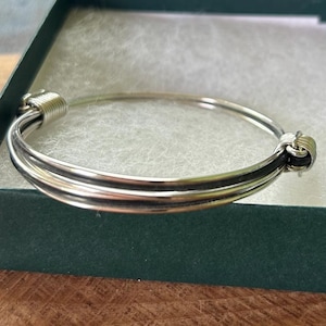 Narrow 3 strand silver & black elephant hair knot bracelet bangle