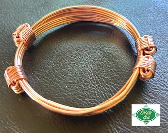 Pulsera tradicional de pelo de elefante de 5 hebras y 4 nudos en cobre